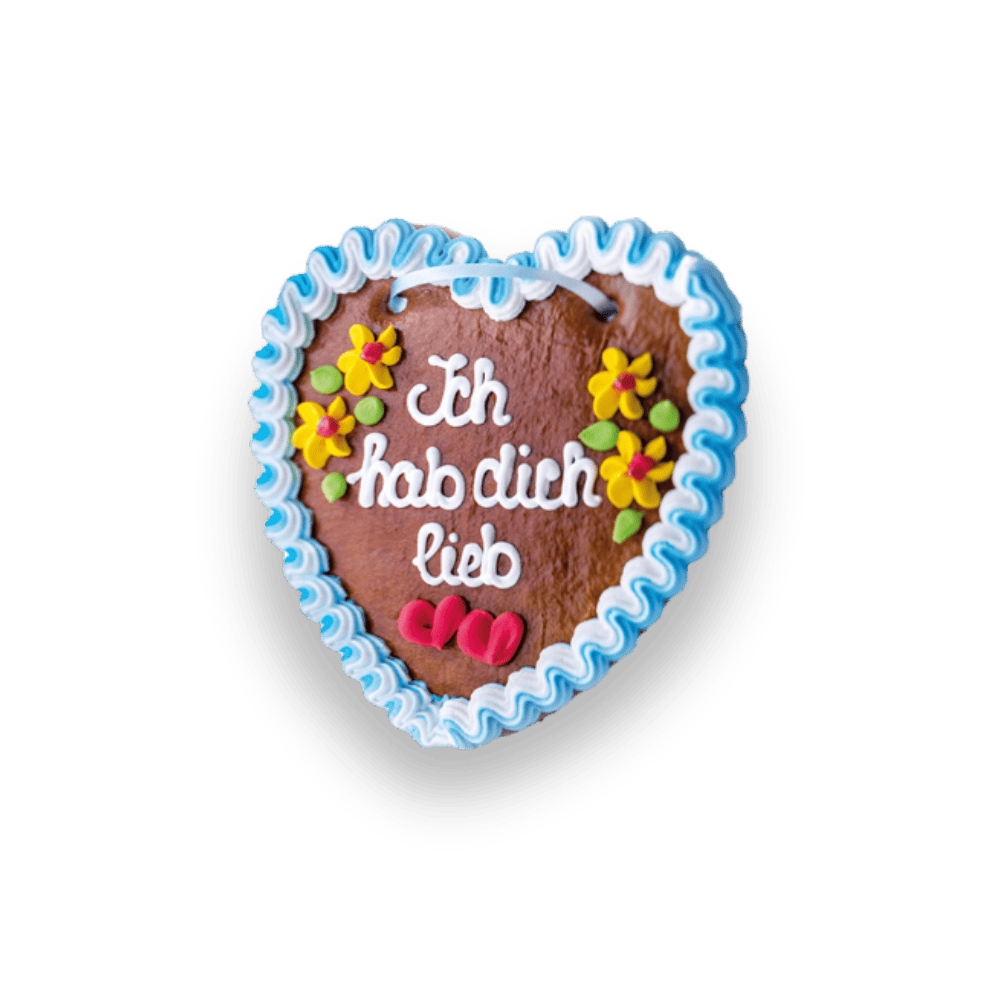 Lebkuchenherz mit blauer Zuckerschrift und Aufschrift „Ich hab dich lieb"